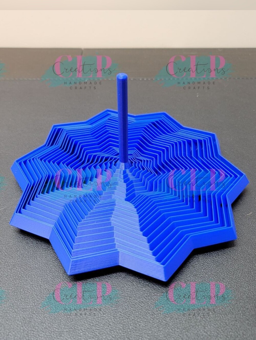 3D Printed Large Blue Geometric Star Spiral Fidget toy
